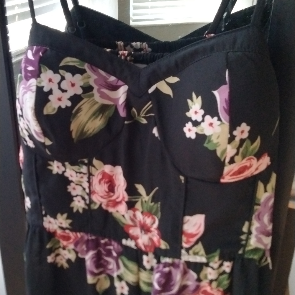 Black and flower,spaghetti strap romper. Size medium